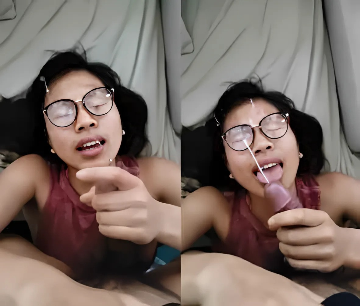 La fille à lunettes aime gicler sur son visage